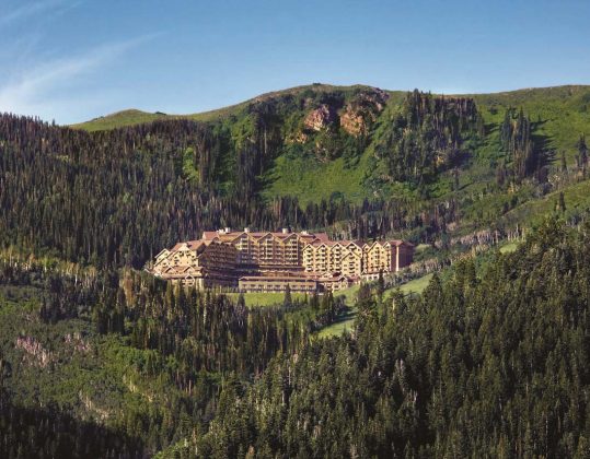 Montage Deer Valley -- aerial (from distance) --- lush setting --- Associated Luxury Hotels International (ALHI)