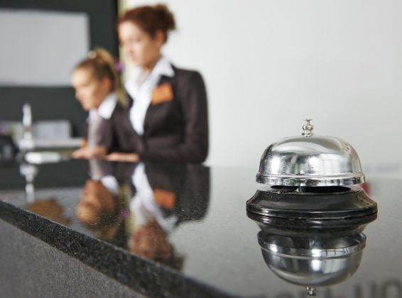 Modern luxury hotel reception counter desk with bell