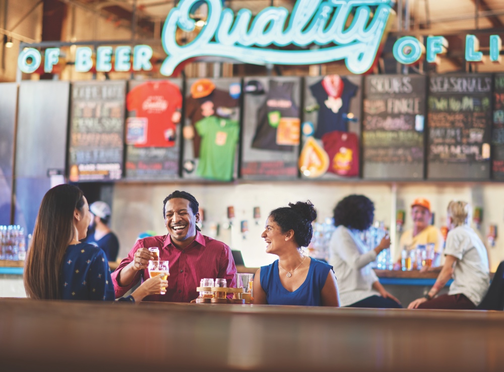 Visitors laughing at Austin Beerworks. March 16, 2023