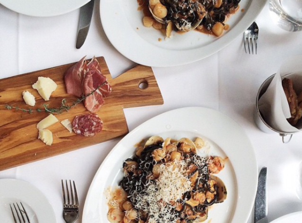 Plates of Italian cuisine at Il Mulino New York. May 25, 2023