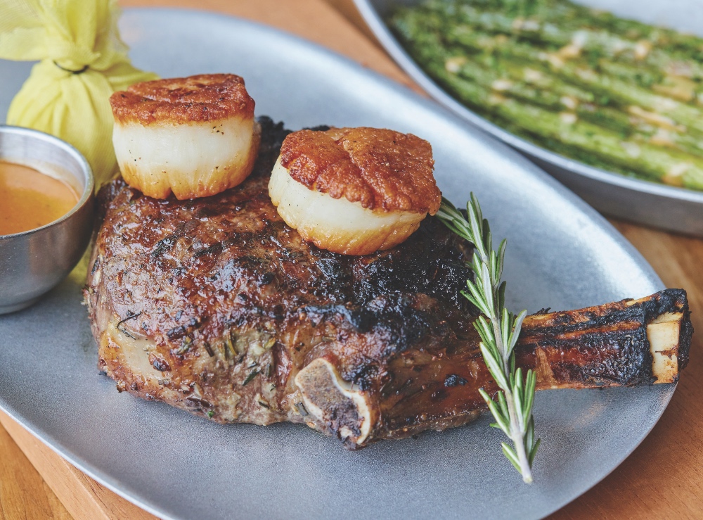 Steak and seafood dishes at black & blue in Burlington. June 19, 2023