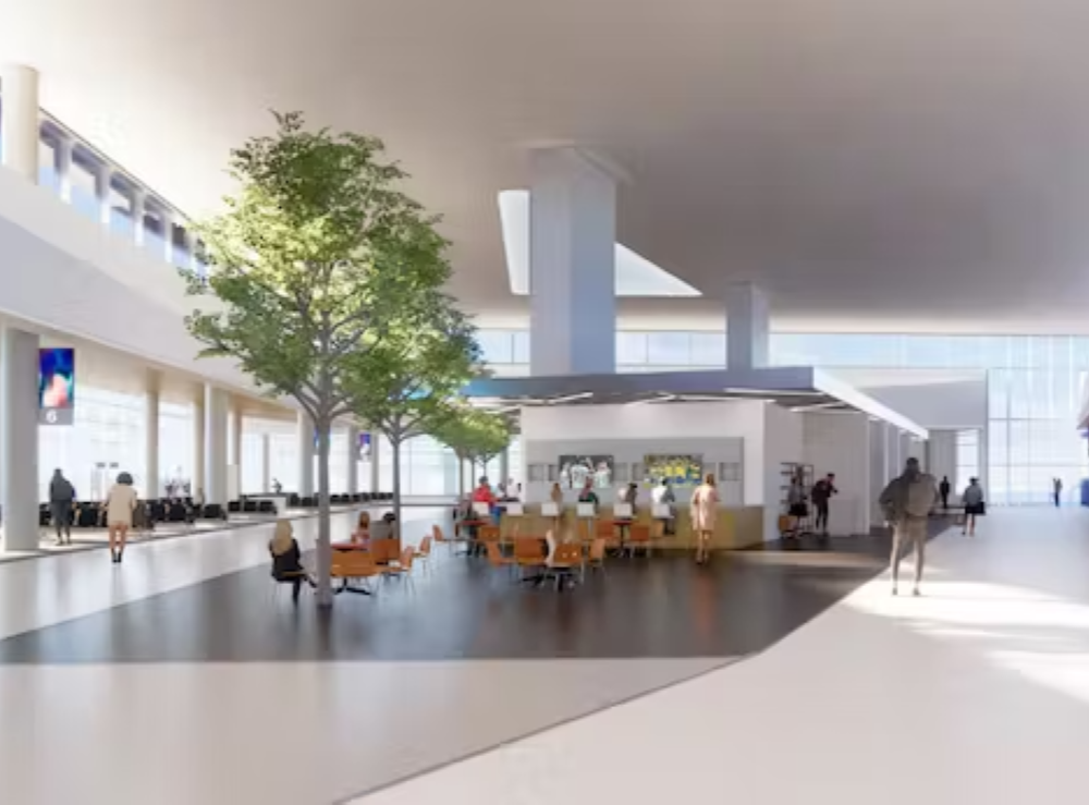 interior of an aiport concourse with sunlight through windows