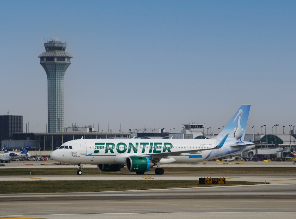 11.27.23 Frontier Airlines jet taxis at O'Hare International Airport in Chicago. The airline will open a pilot base in Chicago in 2024