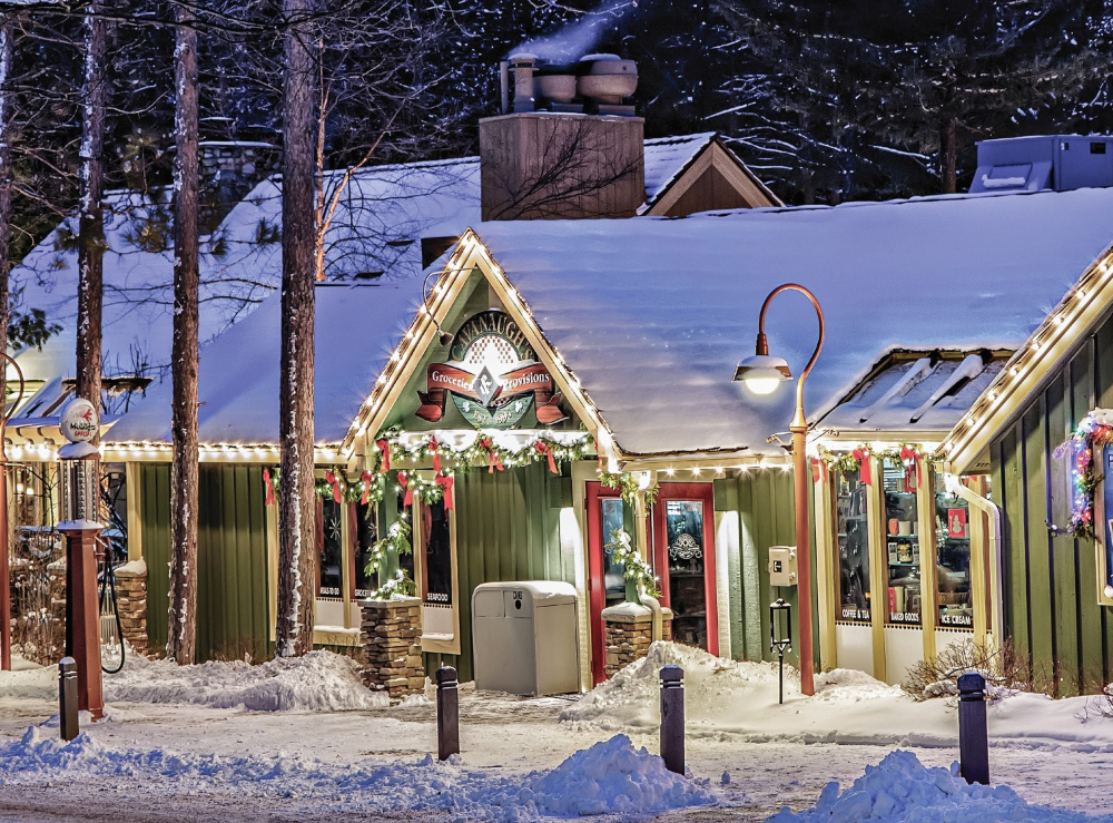 Twinkling lights frame Cavanaugh’s grocery at The Homestead in Glen Arbor