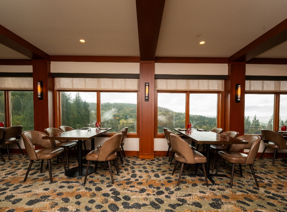 Indoor seating with landscape views at The Restaurant & Terrace Bar. April 16, 2025