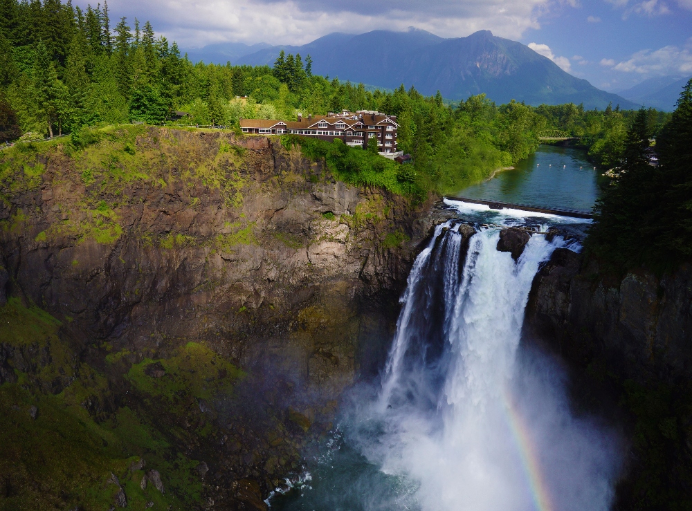 Aerial view of Salish Lodge & Spa with Snoqualmie River and Snoqualmie Falls. April 16, 2025