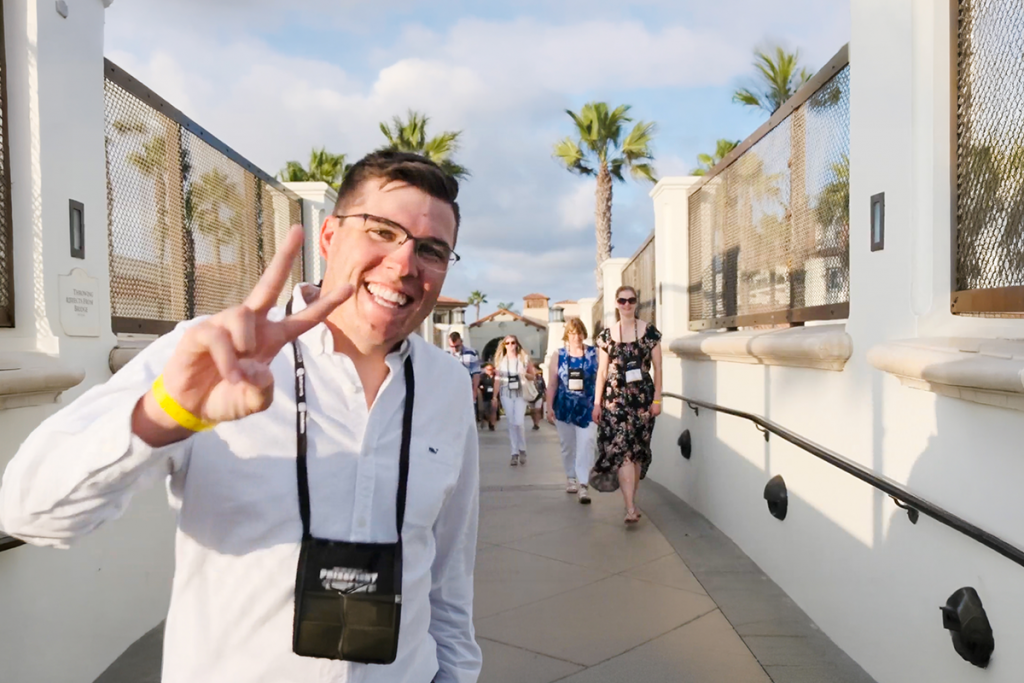 Huntington Beach conference attendee on footbridge