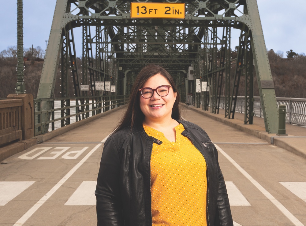 4.24.26 Kelly Nygaard of Discover Stillwater in front of the Stillwater Lift Bridge