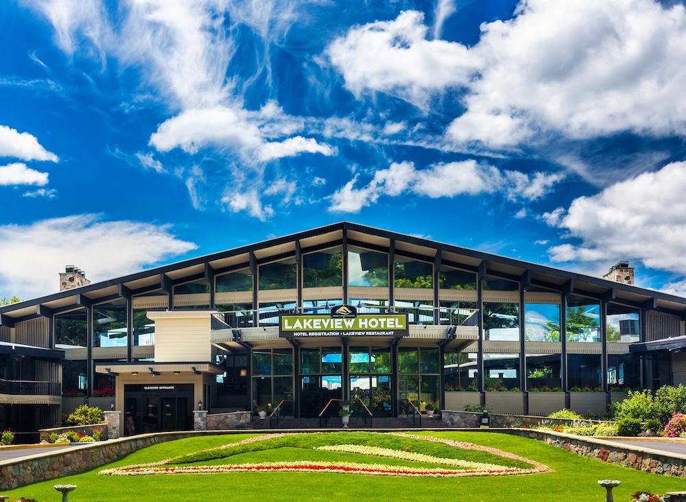 Exterior shot of The Lakeview Hotel on a bright, sunny day