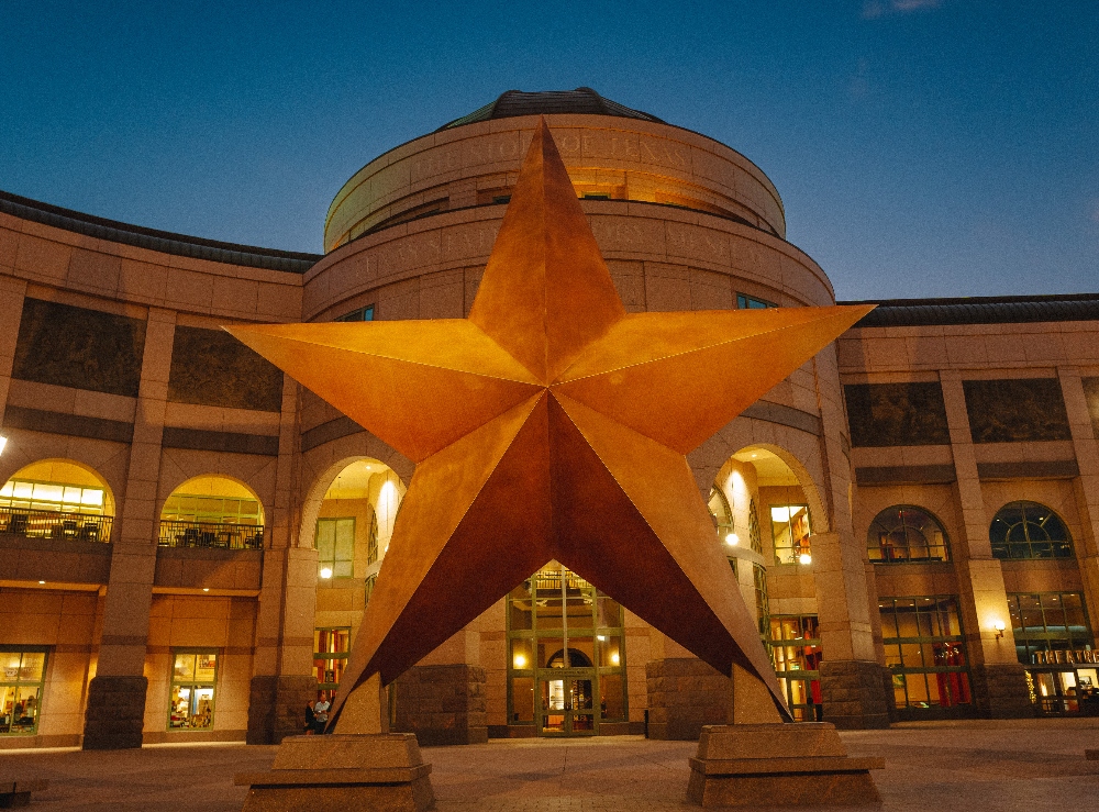 Towering bronze star statue at the Bullock Texas State History Museum in Austin