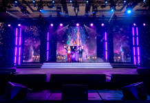 Reduce Event Production Costs With Disney Meetings & Events Mickey on stage with CEO - Disney Meetings & Events